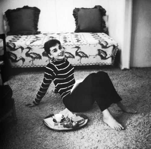 Audrey Hepburn on the phone at her  Beverly Hills apartment during the production of Sabrina (1953).