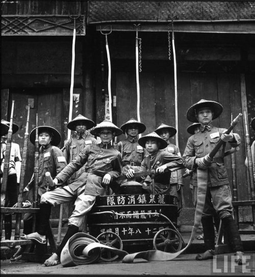 Members of the Home Guard Wearing Their Fire Fighting Costumes and Apparatus, Carl Mydans photo