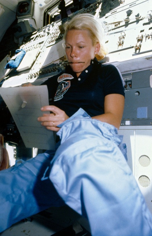 Astronaut Rhea Seddon Works On Flyswatter-like Snagging Device