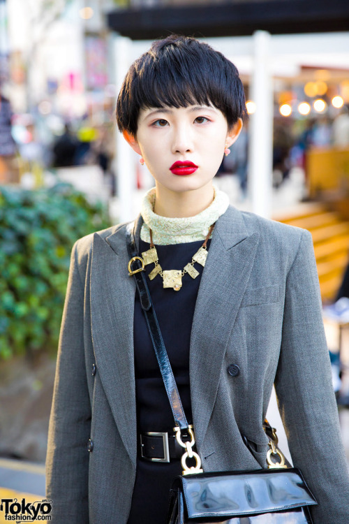 18-year-old Japanese student Meika on the street in Harajuku wearing a grey blazer from The Four-Eye