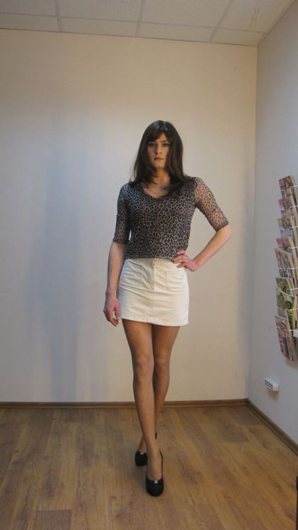 Crossdresser in mini-skirt