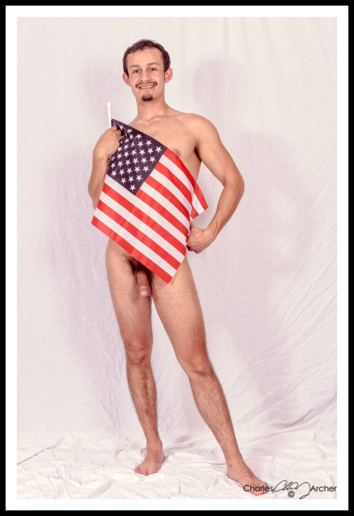 nudephotoguy: DSC 8609-Edit by charlesarcher Happy Memorial Day! Ricky draped in his flag!