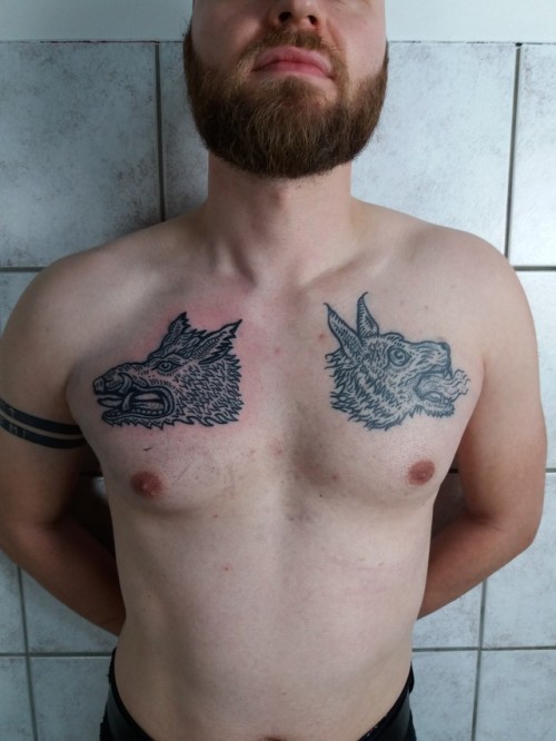 handpoked wildboar and wolf (left new, right healed)