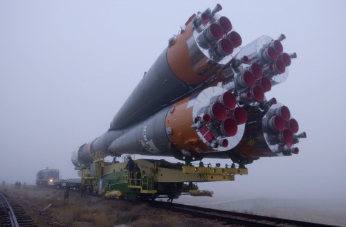 humanoidhistory: ROCKET TRAIN – On a foggy day, a train transports a Soyuz rocket to the launch pad at the Baikonur Cosmodrome in Kazakhstan, October 29, 2000. (NASA)