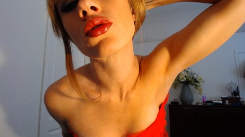 Nice shot from maceyjade in shiny red lipstick