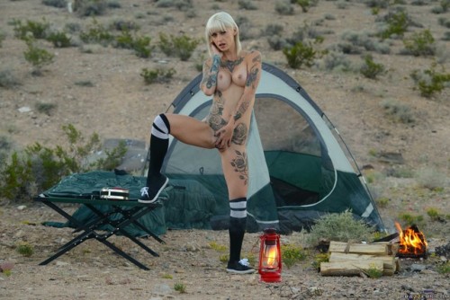 pornstarbodies: Tatted blonde slut Kleio Valentien takes off her clothes while camping.