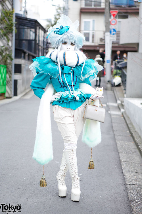 Japanese shironuri artist Minori on the street in Harajuku with a vintage and handmade look features