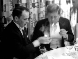 old-school-fools:  Frank Sinatra lighting John F. Kennedy’s cigarette at his inauguration.  