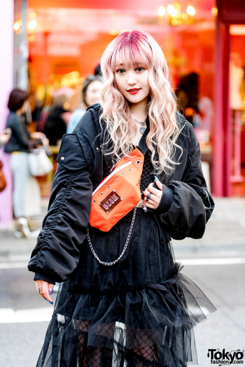 Chamafu on the street in Harajuku wearing a crossbody bag by the Japanese streetwear brand M.Y.O.B. NYC over a Dispark j