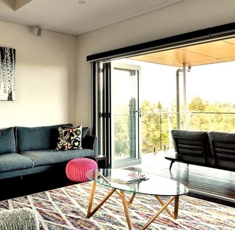 Rooftop Deck In SydneyInspiration For A Mid-sized Scandinavian Rooftop Deck Remodel With A Roof Extension