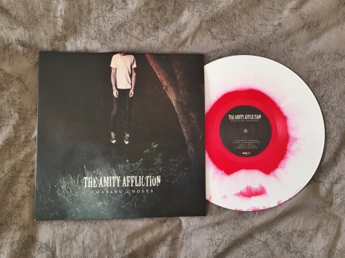 surroundedbyviciouscycles:  Chasing Ghosts by The Amity Affliction // red centered vinyl limited to 150 // handnumbered 34/150