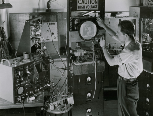 Man testing early television equipment in New York, 1959.Photograph by Willard Culver, National Geog