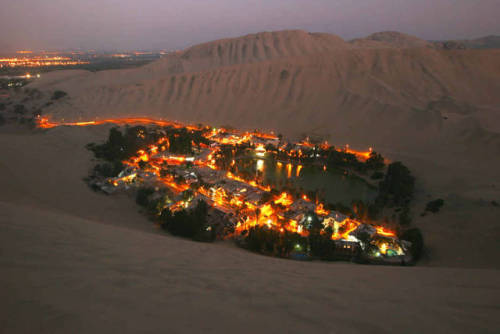 thescorpioking1983: sixpenceee: The Huacachina oasis at the night. From here. Here is my first 