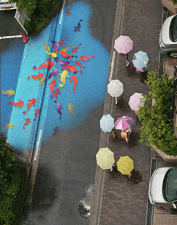 micdotcom:  This stunning street art in South Korea only appears when it’s raining Paint company Pantone teamed up with designers for “Project Monsoon,” an initiative to make South Korea’s capital, Seoul, a little less dreary during monsoon season.