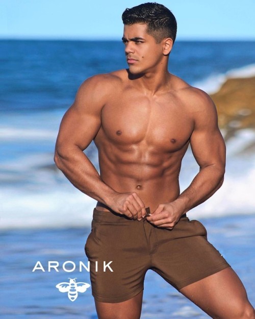 frickssexyfashion:  Jay Torres’ Sexy Muscular Body is showcased perfectly by the Scout Expresso shorts by @aronikswim Your trained legs will look just like Jays, encased perfectly in these 100% Polyester short, which are perfect for the beach. Forget