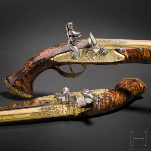 A Pair Of Brass Barreled Flintlock Pistols Crafted By Felix Werder Of Zurich, Switzerland, Circa 1660.