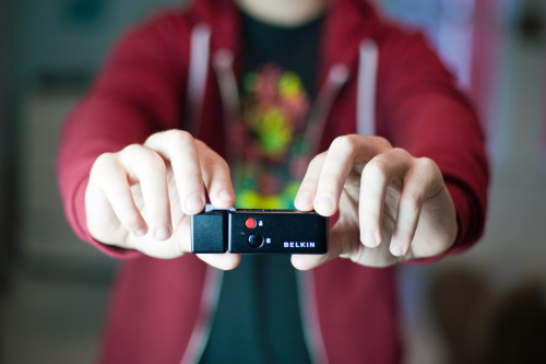 photojojo:  No more bathroom mirror self-ports!  The iPhone Shutter Remote lets you take photos from a distance.  Take photos without laying a finger on your phone