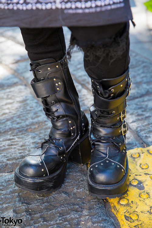 tokyo-fashion:  20-year-old Kenchu in Harajuku wearing a Hood By Air top with a bandana skirt, ripped jeans, studded boots, and clutch/headphones by MCM. Full Look