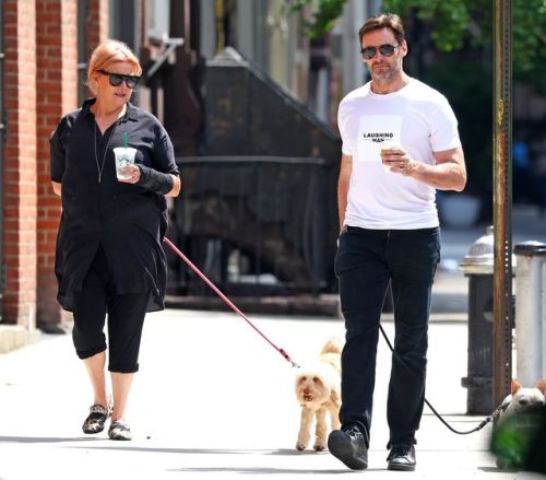 Hugh Jackman Wearing a ‘Laughing Man’ Coffee shop t-shirt out with his wife walking their Dogs Dali 