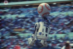 obi-wans-oasis:  R2 shoots!  HE SCORES!!! (Artwork by Paul Wiz Johnson)