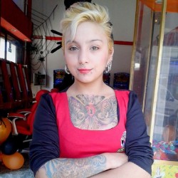 eliona-suicide:  Working #suicidegirls #suicidegirlschile #eliona #blondhair #shorthair #tattooed #eyes #dollface #chileanbeauty #chestpiece #colors #inkedgirls #tattoos 