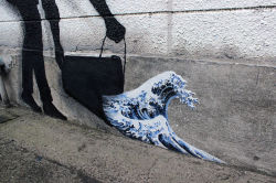 flowartstation:  This Spanish artist turns the streets of Japan into works of art   This Spanish street artist,  Pejac, made some pretty works during his stay in Japan, the stage of his tour of Asia. He,  who until then had mostly walked the streets of