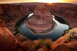 americasgreatoutdoors:  The sun sets behind Horseshoe Bend, a breathtaking creation of the Colorado River meandering through centuries of red rock near Page, Arizona in the Glen Canyon Recreation Area.Photo: Sylvia Zarco 