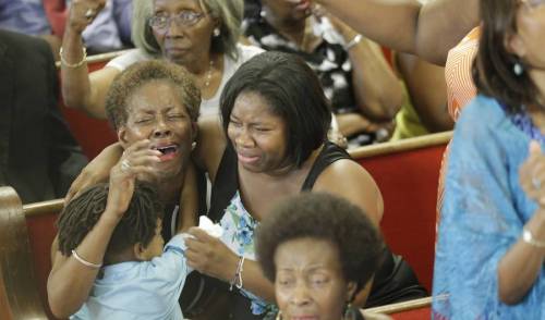 micdotcom:  Emotional photos show the first Sunday service at the Emanuel AME Church after the shootingThe church was packed to capacity; the Associated Press reported parishioners were queued in long lines to get in. Police officers were on the scene