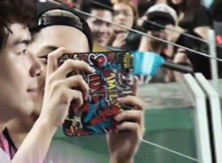 kaura-m:  Fanboy Jongin recording a soccer game ft. his spiderman phone cover 