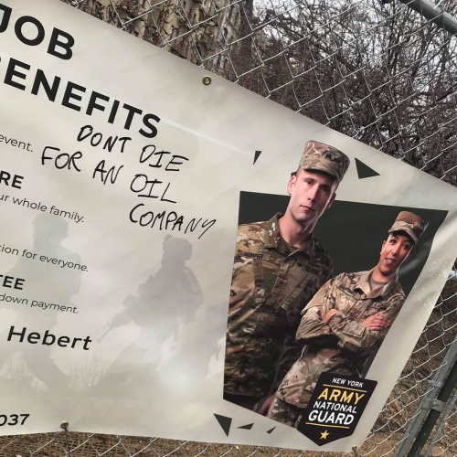 &ldquo;Don&rsquo;t die for an oil company&rdquo; Written on an army recruitment banner in New York C