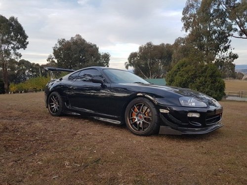 TOYOTA Supra JZA80, 1997 equipped with CEIKA anodized orange yellow big brake kit. Front 8 pot 356x3