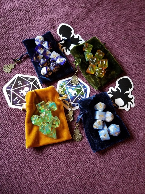 Very happy with my dice sets from Kraken Dice! Top left: Violet Smoke Top right: Fairy Glass Bottom 