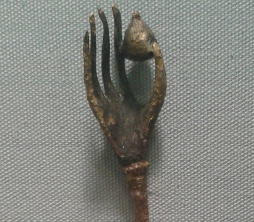 gunhilde:Roman bronze hairpin in the shape of a hand holding a pomegranate, symbolic of the Roman un