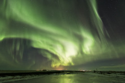 icelandicphoto:  Northern lights dancing over south Iceland. The sun has been super active this winter with solar flares hitting the earth on regular basis and that means wonderful northern lights display if the sky is clear I love it ! 