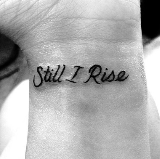 Little Tattoos — Little wrist tattoo saying “Still I Rise”.