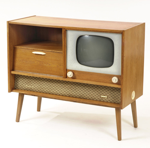 midcenturymodernfreak:  1962 Czech Television Case | Beech and Ash Wood Construction with Cream-Colored Resin Dials This unit only receives a signal broadcast on a UHF frequency that was used by the government for broadcasting during the Communist era