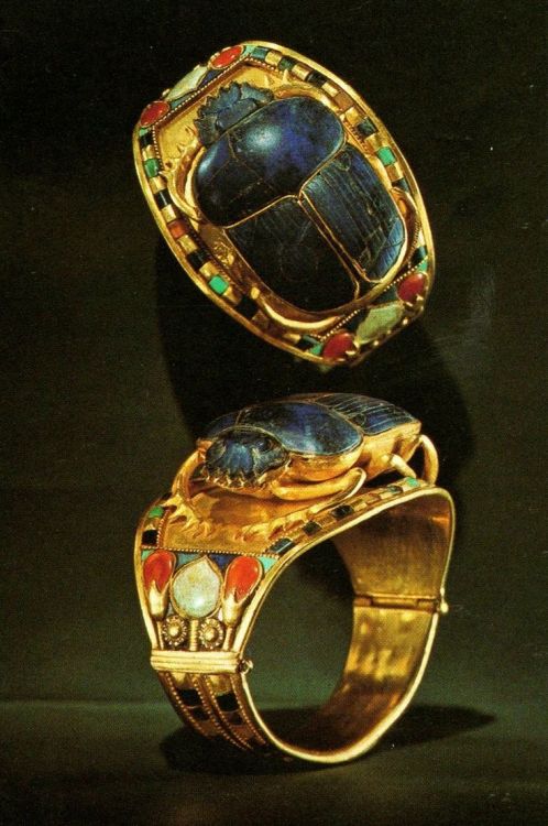 Image from a Tutankhamun Exhibition;  Gold Bangle with Openwork Scarab Encrusted with Lapis Laz