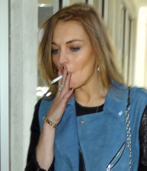 paintdeath:A photoset of Lindsay Lohan smoking. Thank me for it later