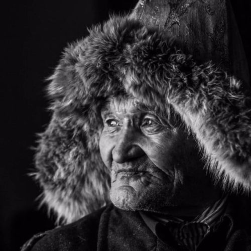 Portraits of ethnic Tajik, Kazakh, Russian, Uyghur, and Kyrgyz men in various hats in Xinjiang.Photo