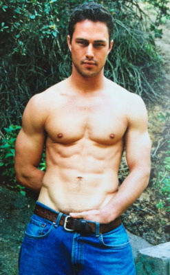 famousdudes:  Taylor Kinney almost shows it all in an old photoshoot.
