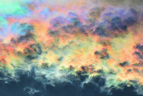 opticallyaroused:  awkwardsituationist:  cloud iridescence — caused as light diffracts through tiny ice crystals or water droplets of uniform size, usually in lenticular clouds — photographed by rolf kohl. (more cloud pics)  