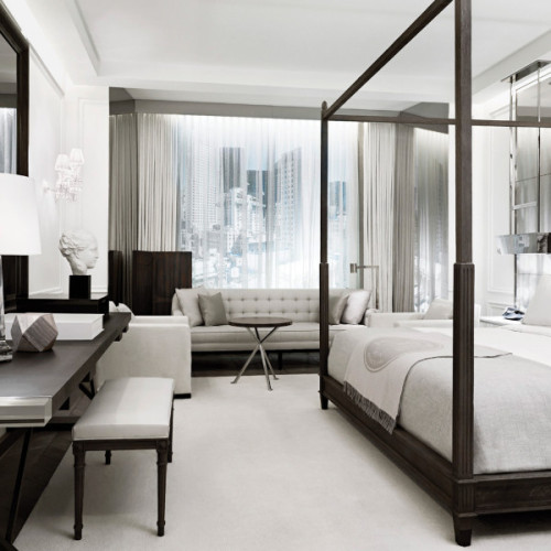 {The glamour and luxury continues in the hotel suites! Creamy white marble with highly polished meta