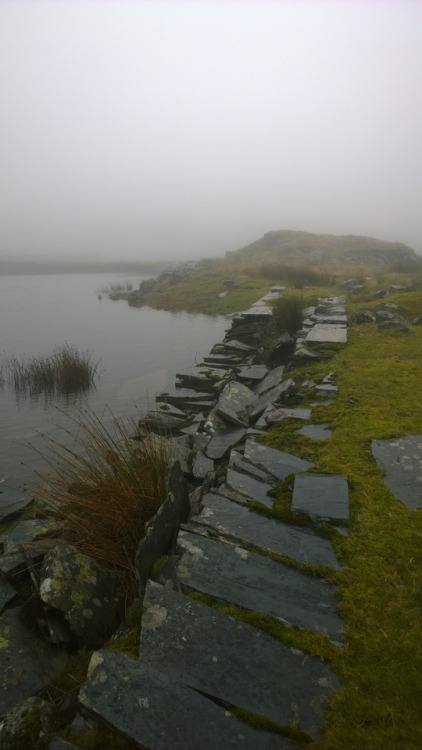High above Blaenau Ffestiniog in the mist and amongst the old slate mine workings and flooded pits.