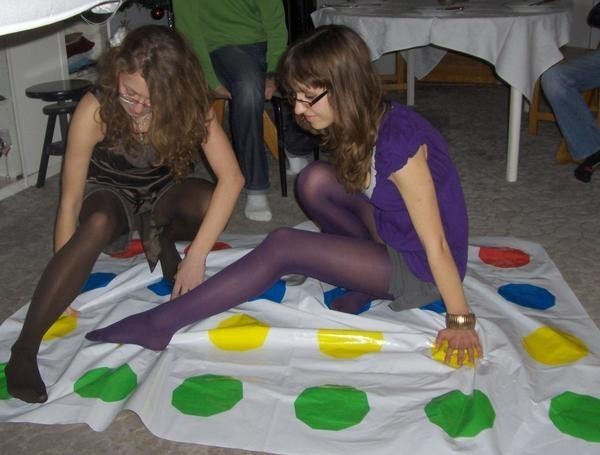 tightsobsession:  Playing twister in tights. Tights week starts November 3rd! 
