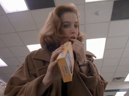 ursulastrausss: Scully looking good while eating choco droppings.