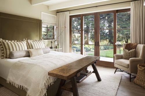 Master bedroom with views of the garden in a Menlo Park residence, San Mateo County, California [561