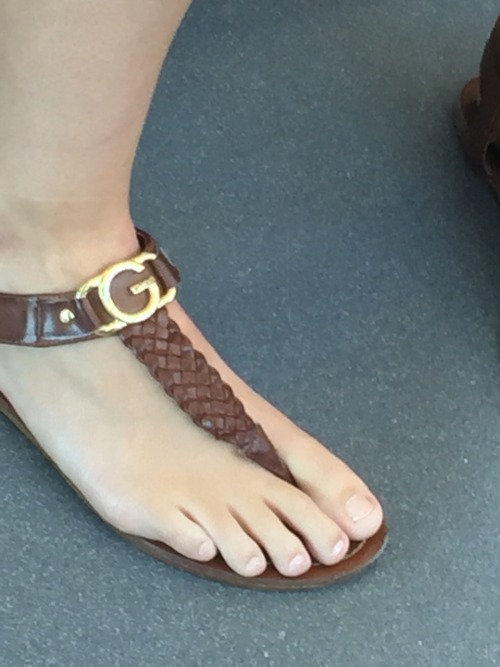 Love those sandals but somebody buy her a pedicure.