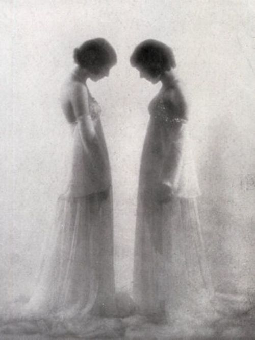 rivesveronique: Full-length portrait, in profile, of two girls. The lovely young women are dressed i