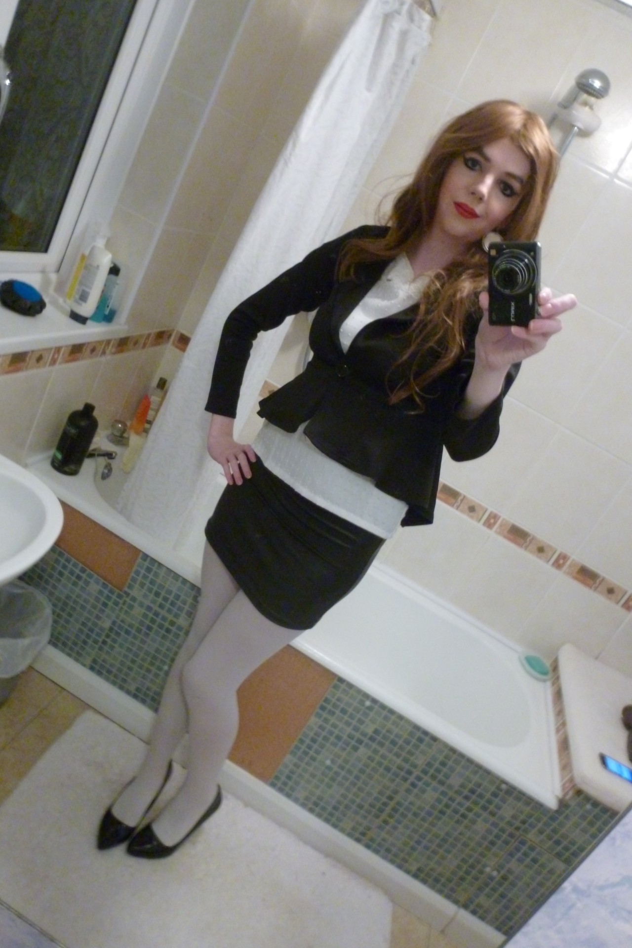 lucy-cd:  Pictures More business, with white tights. So cute &lt;3 