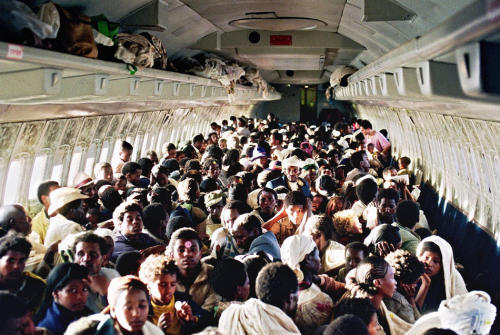 jewish-archives:Ethiopian Jews on a crowded Israeli plane being airlifted out of Ethiopia. During a 